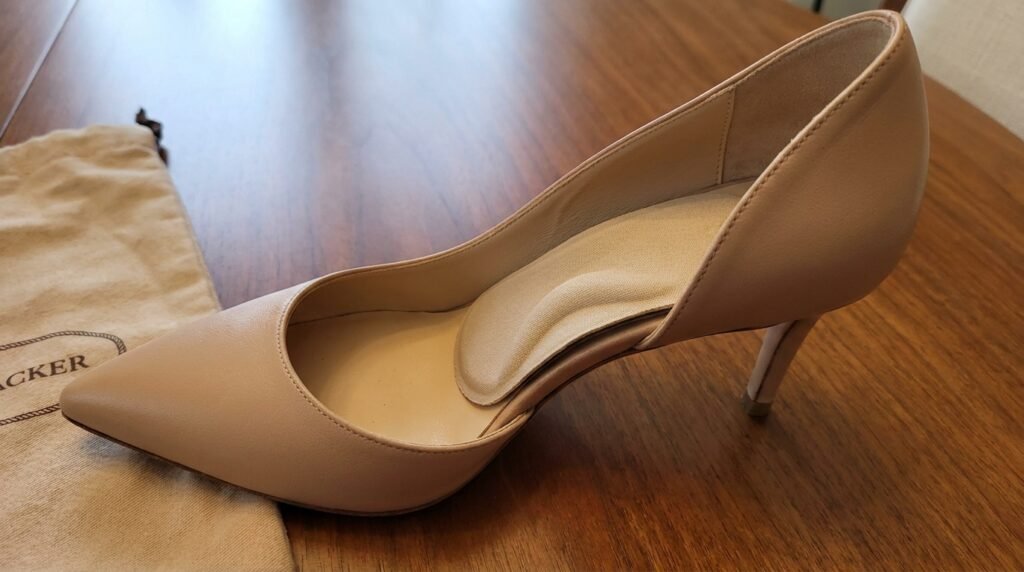 Slim 3/4 arch support insert nestled inside an elegant designer high heel.
